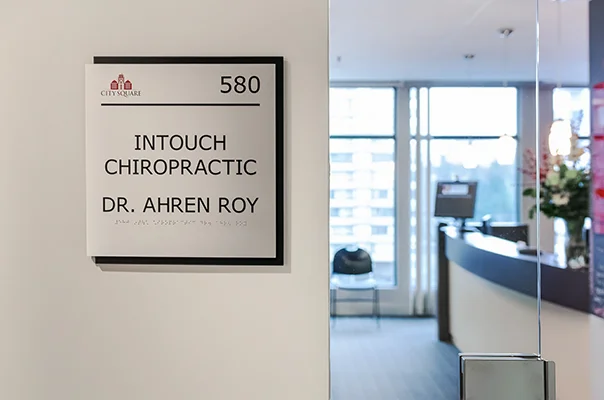 The suite 580 sign beside the clinic's glass entrance